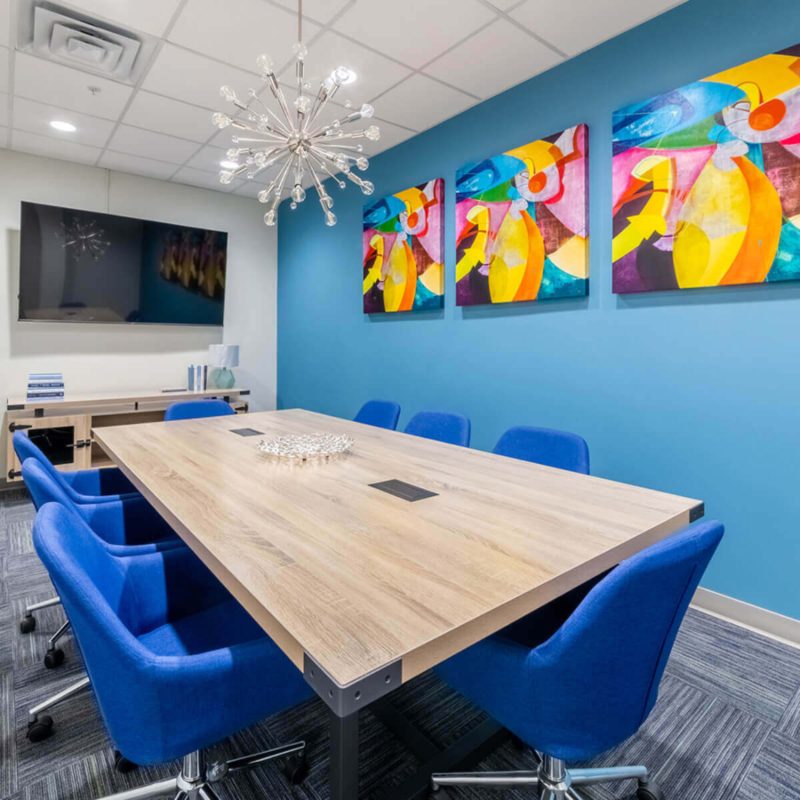 A Conference Room With a Large Wooden Table for Meetings in Houston, TX