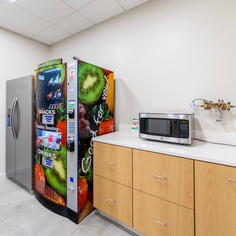 A Vending Machine and Microwave at Urban office in Austin, TX