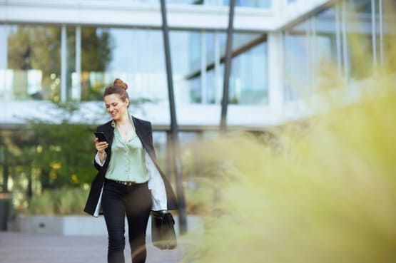 A woman walking out of rented office in Houston & San Antonio
