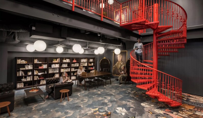 Library in office with red stairs in spring branch from Urban Office