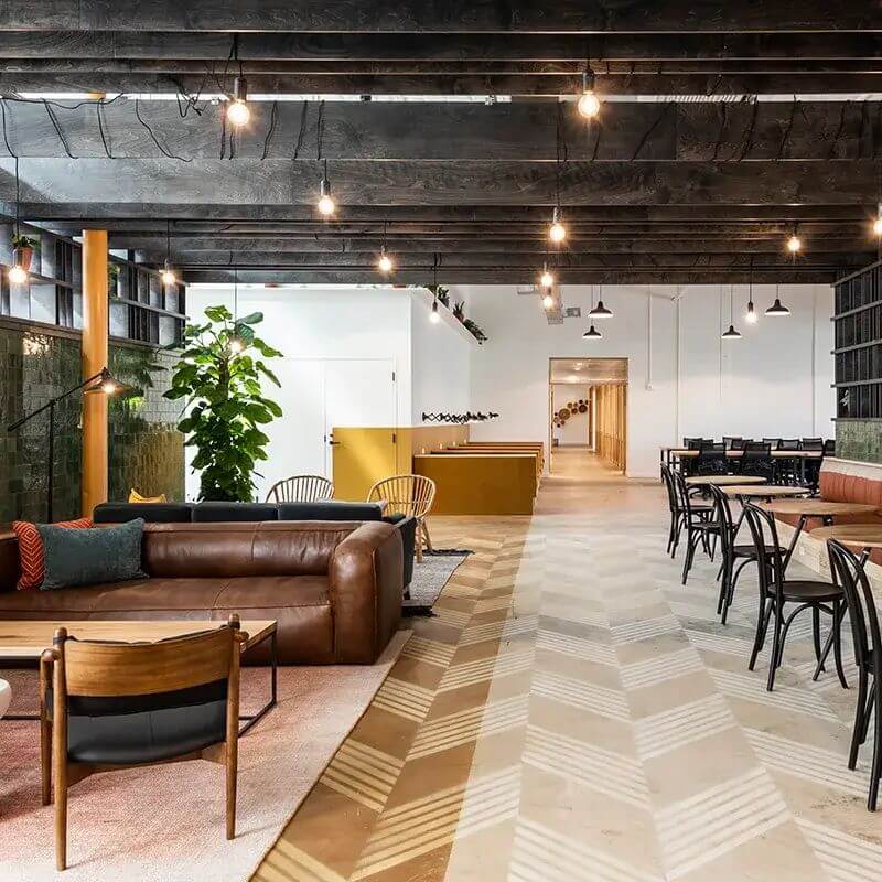 Modern office space in Houston, TX, featuring clean lines and wooden beams