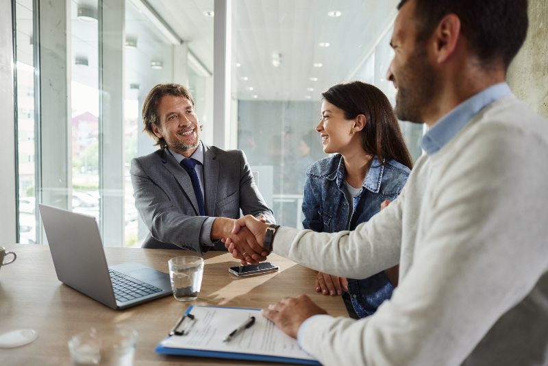 A Professional Handshake Between a Man and Woman in Texas