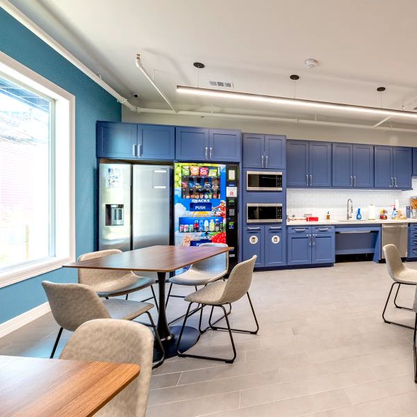Kitchen breakroom with fridge and vending machine for Heights Mansion location for Urban Office